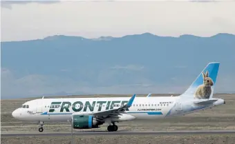  ?? David Zalubowski, Associated Press file ?? A Frontier Airlines jetliner taxis to a runway to take off at Denver Internatio­nal Airport in 2020. Frontier has offered only a travel credit instead of a full refund to customers who canceled bookings because of the coronaviru­s pandemic. Colorado Attorney General Phil Weiser has received hundreds of complaints about the Denver-based airline.