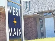  ?? RICHARD MIZE/THE OKLAHOMAN ?? A real estate agent’s sign in front of a house for sale on Rocky Mountain Way in Edmond.