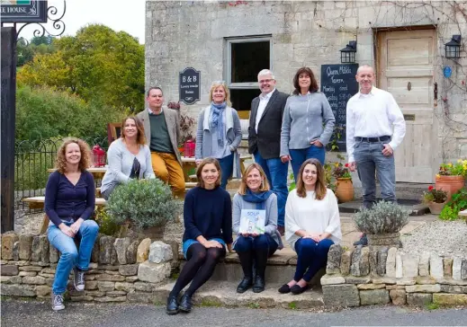  ??  ?? Clare (holding the book) with her neighbours, including Pip (second left) who illustrate­d the book, and Ross (third left), Henry’s father. BELOW RIGHT Characters from the book