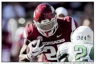  ?? NWA Democrat-Gazette/CHARLIE KAIJO ?? Arkansas running back Devwah Whaley underwent surgery Monday to repair damage to his right ankle after being injured in Saturday’s loss to Ole Miss.