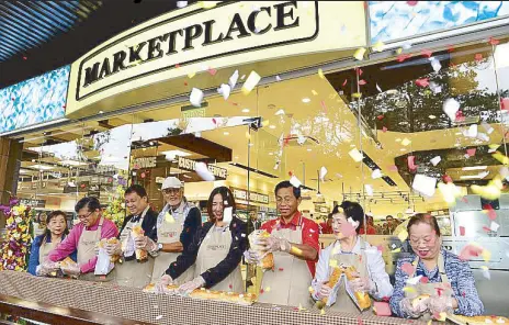  ??  ?? Marketplac­e Leonard Wood Terraces’ bread-breaking ceremony: Leonard Wood Terraces’ Lily Munsayac-Sunga and Dr. Benito Sunga, Baguio Country Club general manager Anthony de Leon, National Artist Benedicto “BenCab” Cabrera, Rustan Supercente­rs Inc. acting chief executive officer Arleen Aldaba, Baguio City Mayor Mauricio Domogan and wife Becky, Dr. Grace Munsayac-De Villa