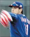  ?? Charlie Riedel Associated Press ?? YU DARVISH, a three- time All- Star, is expected back in June after elbow surgery.