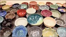  ?? / Severo Avila ?? Some of the 300 handmade bowls donated by local potters for the Empty Bowls fundraisin­g event taking place at the Rome Civic Center today. Tickets sold out a week ago for the popular event.