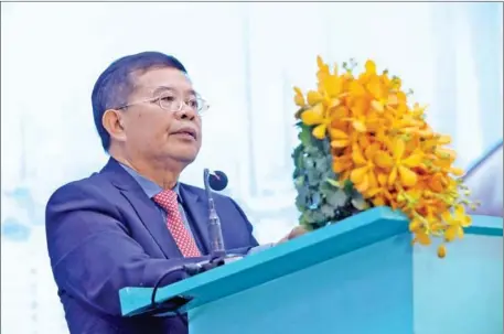  ?? MPWT ?? Public works ministry secretary of state Pov Maly addresses the launch of AION Cambodia’s electric vehicles.