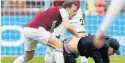  ??  ?? SHAME Mark Noble grapples with a fan