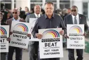  ?? SCOTT OLSON/ GETTY IMAGES FILES ?? The Rev. Jesse Jackson leads a Rainbow PUSH protest.