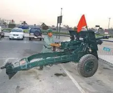  ?? Courtesy: Dubai Police ?? An official prepares one of the Dubai Police’s five cannons, which fire around 180 cartridges during Ramadan and Eid.