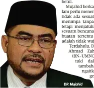  ??  ?? DR Mujahid