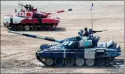  ?? SERGEI BOBYLEV / TASS ?? A tank competitio­n takes place at the Alabino proving ground in Russia on Saturday during the 2018 Internatio­nal Army Games. China hosts some parts of the games this year.