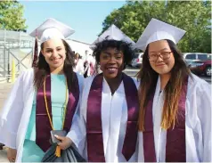  ??  ?? Kalamazoo High School grads (left to right) Caitlyn Boyer, Mar’charnae Martin, and Lucienne Chou