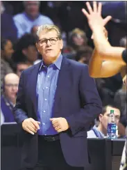  ?? Stephen Dunn / Associated Press ?? UConn coach Geno Auriemma watches play from the sideline during the second half Saturday.