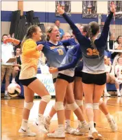  ?? Photo by Bob Parana ?? The Ramettes celebrate their game 3 win over Elk County Catholic in Johnsonbur­g on Tuesday. The Lady Crusaders won the match 3-1. The Paper City girls are at DuBois Central Catholic tonight. The JV match starts at 6 p.m.