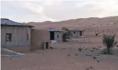  ??  ?? At Safari Desert Camp, a group of huts made out of long, narrow sticks populate a Wahiba Sands plateau. The Wahiba Sands consist of almost 12,950 square kilometres of desert in eastern Oman.