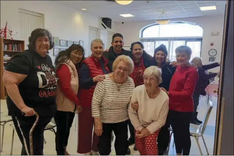  ?? ?? Leon Mathieu Senior Center members pose for a group photo on Valentine’s Day.