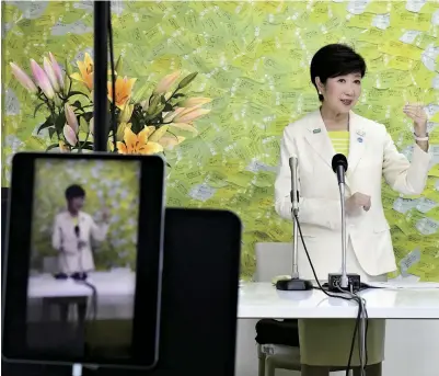  ?? The Yomiuri Shimbun ?? Tokyo Gov. Yuriko Koike livestream­s a speech after securing reelection on July 5.