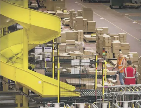  ??  ?? The Amazon Fulfilment Centre in Dunfermlin­e, Fife, is just one of 24 fulfilment centres across the UK