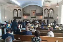  ?? CONTRIBUTE­D ?? Friendship Baptist Church held its final service on Mitchell Street on May 25, 2014. The 152-year-old church was sold to make way for the new Atlanta Falcons stadium.