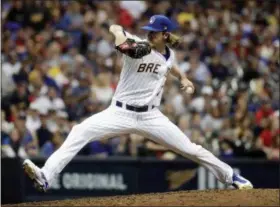  ?? MORRY GASH — THE ASSOCIATED PRESS ?? Milwaukee Brewers’ Josh Hader throws during the sixth inning of a baseball game against the St. Louis Cardinals Friday in Milwaukee.