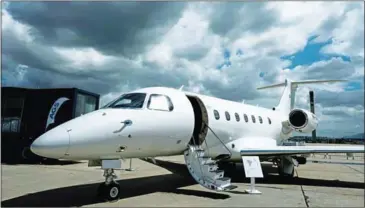  ?? YASUYOSHI CHIBA/AFP ?? Embraer’s mid-sized Executive Jet Legacy 500 is exhibited during the first edition of the Internatio­nal Brazil Air Show at Tom Jobim internatio­nal airport in Rio de Janeiro, Brazil, on Wednesday.