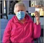  ?? SUBMITTED ?? Jean Harvey of Kirtland holds her vaccine card after receiving her first dose on Feb. 5 at the Coulby Park distributi­on site in Wickliffe.