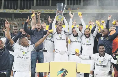  ?? Picture: Backpagepi­x ?? GLORY NIGHT. Cape Town City players with the MTN8 trophy after beating SuperSport United in the final in Durban on Saturday night.