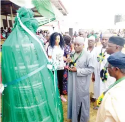  ?? Photo: Dickson Adama ?? Plateau State Deputy Governor, Professor Sonny Tyoden, unveils the state’s Business Hub magazine, during the opening ceremony of the Jos Trade Fair at the Polo Field, Joseph Gomwalk Road in Jos, yesterday