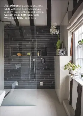  ??  ?? En suite Dark grey tiles offset the white walls and beams, lending a modern touch to the period setting. Custom-made bathroom, Little White Box. Tiles, Topps Tiles.