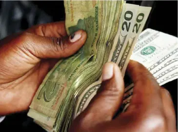  ??  ?? Some shelf companies are accused of offloading the Zimbabwean dollar at the auction and accessing foreign currency, which they divert to the parallel market.