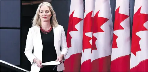  ?? JUSTIN TANG / THE CANADIAN PRESS ?? Minister of Environmen­t and Climate Change Catherine McKenna arrives in the National Press Theatre in Ottawa on Thursday to discuss environmen­tal and regulatory reviews related to major projects.