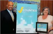  ?? SUBMITTED PHOTO ?? Chester County Commission­ers Terence Farrell and Kathi Cozzone accept the National Digital Counties Survey award at the National Associatio­n of Counties Conference in Columbus, Ohio.