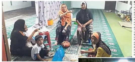  ??  ?? Rough start: Fadhilah (wearing orange towel) with her two grandchild­ren and three other family members about to have ‘sahur’ at the surau. Their houses in Kampung Bukit Kecik in Balik Pulau, Penang, were affected by floodwater­s. (Below) Firemen aiding...