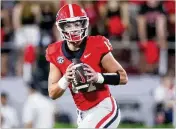  ?? JASON GETZ/AJC 2023 ?? Gunner Stockton saw little action last season until the Orange Bowl game, where he completed 6-of-10 passes for 96 yards and two touchdowns.