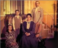  ?? PHOTO BY KATHI CHRISTIE ?? Shown in this Banks Family portrait are Bridget Ottinger, left, as Jane Banks (on knees), Zach Green as Michael Banks, Lindsey Villecco as Mrs. Banks (seated) and Jordan Baylor as Mr. Banks.