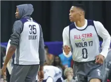  ?? RONALD MARTINEZ / GETTY IMAGES ?? Kevin Durant (left) and Russell Westbrook work out ahead of Sunday’s NBA All-Star Game in New Orleans, Louisiana.