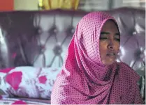  ?? Chaideer Mahyuddin / AFP ?? Yusra Fitriani mourns in a room that was supposed to be her bridal bedroom in Pidie Jaya, Aceh province.