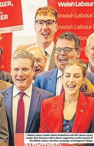  ?? ?? > Welsh Labour leader Mark Drakeford and UK Labour party leader Keir Starmer with Labour supporters at the launch of the Welsh Labour election campaign at Bridgend College