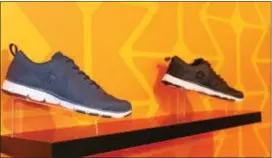  ?? MiCHileA PAtteRSoN — DiGitAl FiRSt MeDiA ?? Athletic shoes are on display at the retail store RBX.
