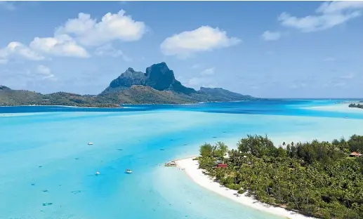  ?? PHOTOS: BROOK SABIN ?? The Bora Bora lagoon is breathtaki­ng and full of sea life.