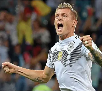  ??  ?? What a feeling: Toni Kroos celebrates after his last-gasp free-kick gives Germany a 2-1 win over Sweden