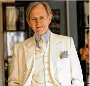  ?? NEW YORK TIMES FILE ?? Author Tom Wolfe, seen in his Manhattan apartment in 1998, was known for his clever word play and books such as “The Bonfire of the Vanities.” He died Monday at the age of 88.