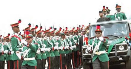  ?? Photo: Shehu K. Goro ?? Vice President Yemi Osinbajo reviews a parade during the combined passing- out ceremony of the 64,65 Regular Courses and Short Service Course 44 at the Nigeria Defence Academy in Afaka, Kaduna yesterday