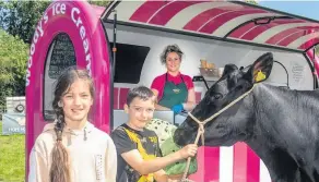  ??  ?? What’s cone on? Emma Kerr, Coylton, and Adam Mackie of Stair with Stairvale Princess enjoying Jill Woodburn’s ices