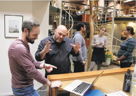  ?? Michael Macor / The Chronicle ?? Working at Traction’s office are James Thill (left), Adam Kleinberg, Kris Udang, Kayla Koterbay and Lauren McGehee.