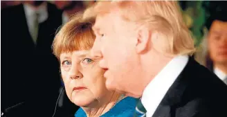  ?? JONATHAN ERNS/REUTERS ?? Conversa. Merkel (E) já deu recado a Trump de que espera a Alemanha fora da sobretaxa