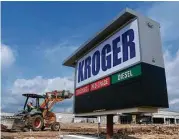  ?? Mark Mulligan / Houston Chronicle file ?? A Kroger Marketplac­e goes up last year at 14221 E. Sam Houston Parkway North.