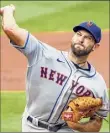  ??  ?? Icon Sportswire via Getty Images Michael Wacha was 1-4 with a 6.62 ERA with the Mets in 2020. The Rays hope he can help make up for the departure of Charlie Morton.