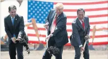  ?? EVAN VUCCI THE ASSOCIATED PRESS ?? Wisconsin Gov. Scott Walker, U.S. President Donald Trump and Foxconn Chairman Terry Gou break ground at the Foxconn facility in Mt. Pleasant, Wis., in June.