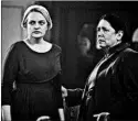  ?? GEORGE KRAYCHYK/HULU ?? Elisabeth Moss, left, and Ann Dowd in “The Handmaid's Tale,” an outstandin­g drama series nominee. Peter Dinklage, of “Game of Thrones,” got a supporting actor nod.