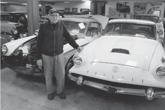  ?? PHOTOS: ALYN EDWARDS/DRIVING ?? Barney Vinegar with the ultrarare 1958 Packard Hawk he restored after buying it in Texas. There were only 588 of this model manufactur­ed in the last year of Packard production. The model’s rarity and style make it a favourite among collectors.