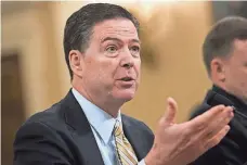  ?? DREW ANGERER, GETTY IMAGES ?? FBI Director James Comey said Wednesday he had no choice but to tell lawmakers about reopening the Clinton email probe.